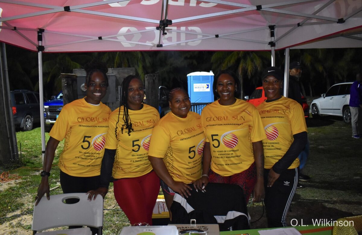 Global Sun Integration volunteers at the registration table before sunrise