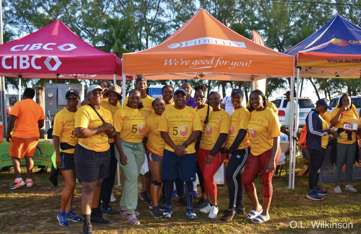 Global Sun Integration staff gathered under the event tents before the race
