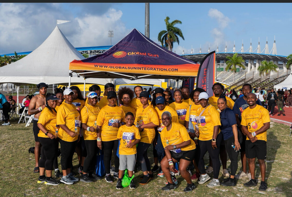 The Global Sun Integration team gathered at their tent for the 10th Anniversary 5K The Jay Way